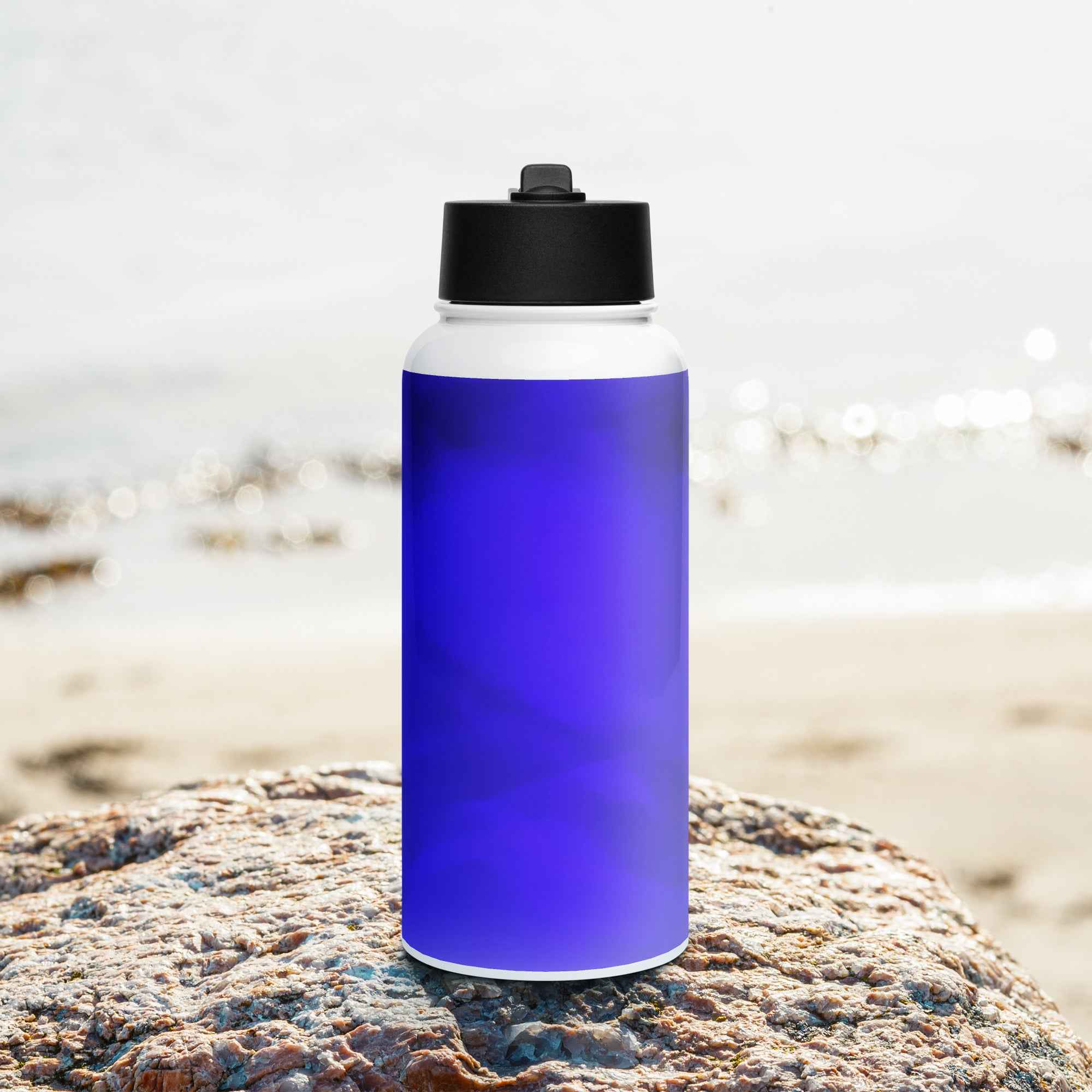 Stainless steel water bottle with a straw lid